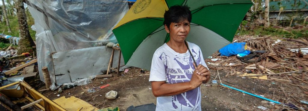 Hurricane Disaster Woman With Umbrella